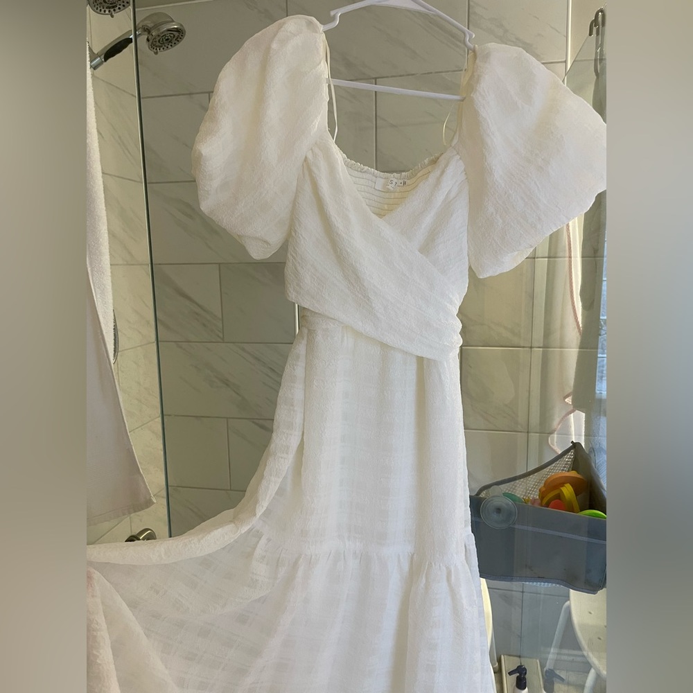 White smocked puff sleeve wrap dress